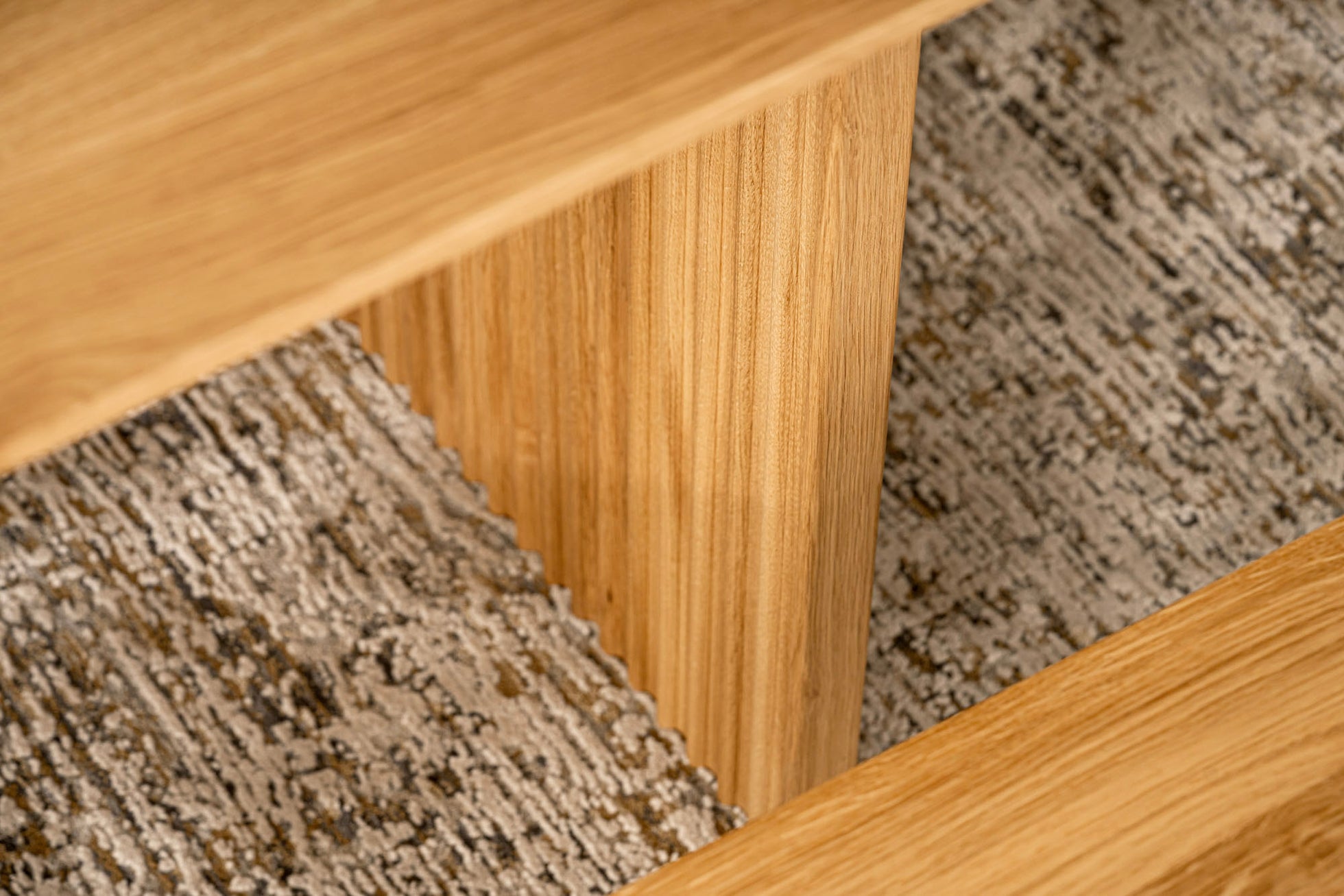 Vertical slatted legs inspired by traditional Japanese Engawa architecture.